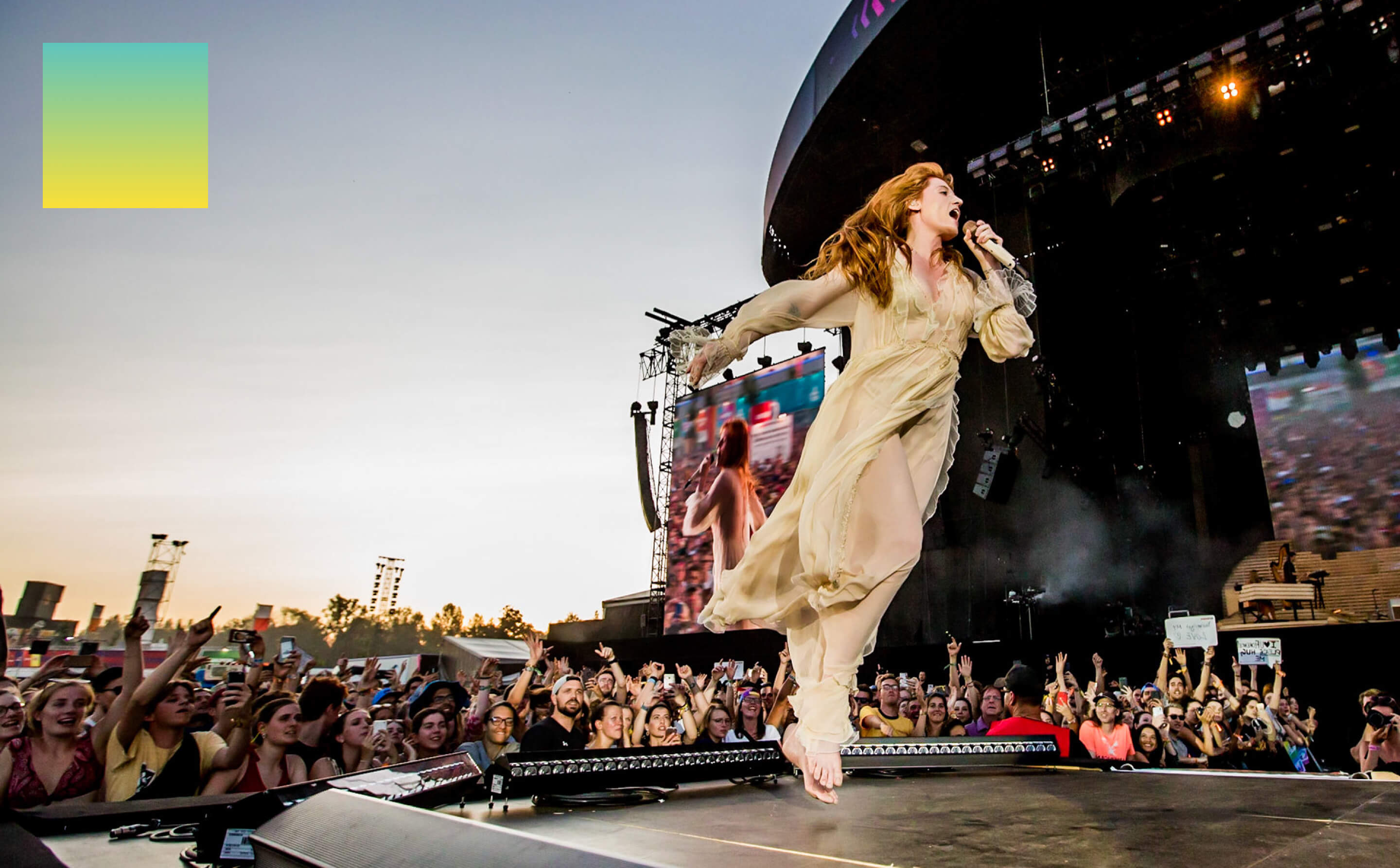 Florence and the machine jumping on stage